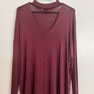 Maroon colored V-neck collar shirt
